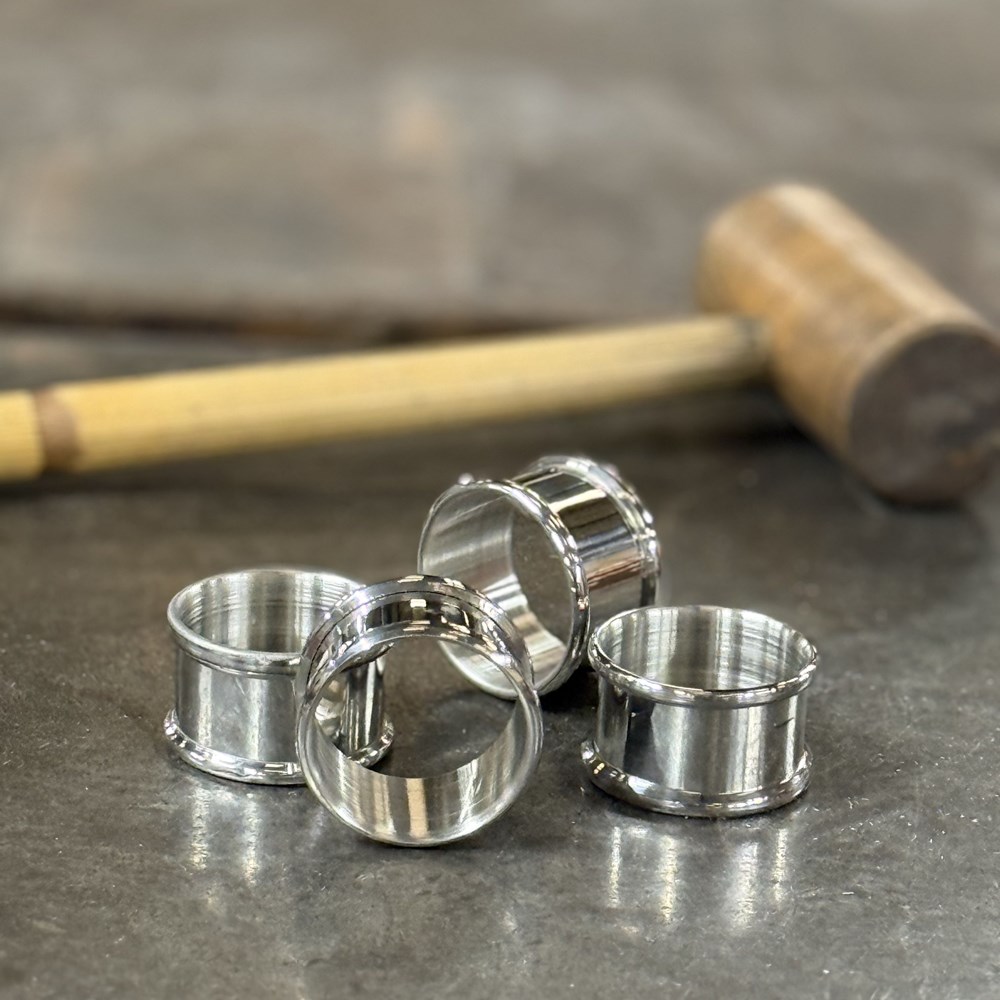 Set Of Four Pewter Napkin Rings
