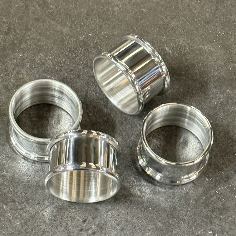 Set Of Four Pewter Napkin Rings