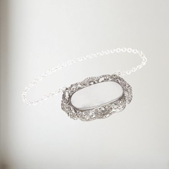 Cast Pewter Shell Pattern Decanter Label