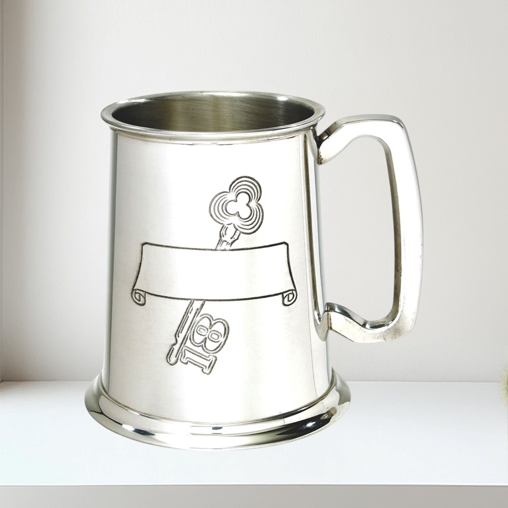 18 key and scroll stamped pewter tankard